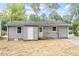 Back exterior featuring gray siding, newly replaced roof, and lots of space at 2612 Glenbrook Dr, Durham, NC 27704