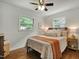 Bedroom with hardwood floors, white walls, and lots of natural light at 2709 Farthing St, Durham, NC 27704
