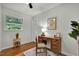 Office with hardwood floors, white walls, and lots of natural light at 2709 Farthing St, Durham, NC 27704