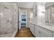 Bathroom with a walk-in shower and dual sinks that leads into the main bedroom at 2908 Stubble Field Dr, Raleigh, NC 27613