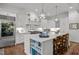 A gourmet kitchen featuring a large island, stainless steel appliances, and an open concept design at 2908 Stubble Field Dr, Raleigh, NC 27613