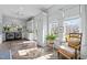 Bright laundry room with modern appliances, stylish patterned floors, a dog wash station and built-in cabinets at 2908 Stubble Field Dr, Raleigh, NC 27613
