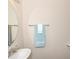 Powder room features modern faucet and decorative towels at 3000 Summerhouse Rd, Cary, NC 27519
