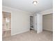 Bedroom with stairs, open closet and bathroom at 3000 Summerhouse Rd, Cary, NC 27519