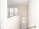 Entryway with stairs leading down and a door with blinds to the backyard at 3000 Summerhouse Rd, Cary, NC 27519