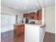 Kitchen area featuring an island, stainless appliances, and hardwood floors at 3000 Summerhouse Rd, Cary, NC 27519