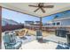Outdoor living at its finest: enjoy seating, a fire pit, and a built-in grill at 311 Windrush Ln, Durham, NC 27703