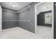 Spacious walk-in closet with adjustable shelving and ample storage space at 311 Windrush Ln, Durham, NC 27703