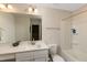 Clean bathroom featuring a vanity, commode, and a combined tub and shower at 313 Kineton Woods Way Way, Garner, NC 27529
