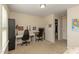 Bedroom with built-in desks and wall art at 313 Kineton Woods Way Way, Garner, NC 27529