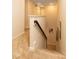 Hallway with carpet floors and wooden railing on a staircase leading to upper or lower level at 313 Kineton Woods Way Way, Garner, NC 27529