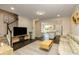 Open-concept living room with modern flooring and ample natural light at 313 Kineton Woods Way Way, Garner, NC 27529
