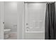 Bathroom featuring a toilet and shower with black curtain at 323 Oak Branch Trl, Garner, NC 27529