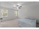 Bedroom featuring a bed and natural light from two windows at 323 Oak Branch Trl, Garner, NC 27529
