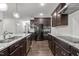 Modern kitchen featuring stainless steel appliances, granite countertops, and ample counter space at 323 Oak Branch Trl, Garner, NC 27529