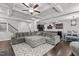 Spacious living room with coffered ceilings, an open floor plan, and hardwood floors at 323 Oak Branch Trl, Garner, NC 27529