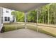 Enjoy the outdoors bug-free from this screened-in porch overlooking a private, wooded backyard at 323 Oak Branch Trl, Garner, NC 27529