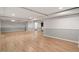 Spacious basement featuring wood-look flooring, painted walls, and recessed lighting at 3402 Pat Tilley Rd, Bahama, NC 27503