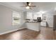 Eat-in kitchen features an island and white cabinetry at 3402 Pat Tilley Rd, Bahama, NC 27503