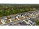 Beautiful new construction homes line a street in a lovely wooded neighborhood at 3866 Keohane Dr, Durham, NC 27705