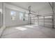 Clean, spacious garage with natural light and an automatic door at 3866 Keohane Dr, Durham, NC 27705