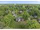 Bird's eye view of brick home with a welcoming front porch surrounded by lush greenery at 406 N Wakefield St, Zebulon, NC 27597