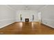 Inviting living room featuring hardwood floors, fireplace, and neutral colors at 406 N Wakefield St, Zebulon, NC 27597