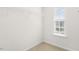 Bright closet features a window and carpeted floor at 408 Ember St, Sanford, NC 27330