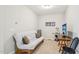 Cozy bedroom setup with futon, TV, and small workout equipment at 409 Summit Trail Dr, Hillsborough, NC 27278