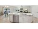 Spacious island and view of the dining room featuring modern appliances and cabinetry at 409 Summit Trail Dr, Hillsborough, NC 27278
