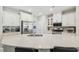 Bright kitchen showcasing a large island, stainless steel appliances, and white cabinetry at 409 Summit Trail Dr, Hillsborough, NC 27278