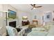 Cozy living room featuring a fireplace, vaulted ceiling, and comfortable seating at 409 Summit Trail Dr, Hillsborough, NC 27278