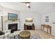 Inviting living room showcasing a fireplace and comfortable seating arrangement at 409 Summit Trail Dr, Hillsborough, NC 27278