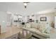 Spacious open-concept living space featuring a kitchen island and dining area at 409 Summit Trail Dr, Hillsborough, NC 27278