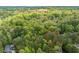 Aerial view of the wooded lot near Crabtree Valley Mall with a red boundary line at 4120 Picardy Dr, Raleigh, NC 27612