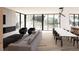 Spacious living area with modern furniture, fireplace, and bright natural light at 4120 Picardy Dr, Raleigh, NC 27612