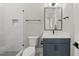 Stylish bathroom boasts a glass-enclosed shower, modern fixtures, and a sleek vanity at 4139 Rockingham Dr, Raleigh, NC 27609