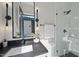 Modern bathroom featuring sleek vanity, contemporary lighting, and a luxurious glass-enclosed shower at 4139 Rockingham Dr, Raleigh, NC 27609