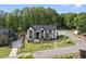 Stunning modern home featuring a sleek exterior, manicured lawn, and beautiful landscaping at 4139 Rockingham Dr, Raleigh, NC 27609