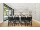 Eat-in kitchen featuring a center island with seating and modern stainless steel appliances at 4139 Rockingham Dr, Raleigh, NC 27609
