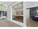 Beautifully designed wine cellar with custom racks and glass enclosure at 4139 Rockingham Dr, Raleigh, NC 27609