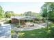 Aerial view of the property, highlighting the brick home, carport, and generous outdoor space at 449 Hill Rd, Franklinton, NC 27525
