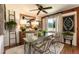 Charming dining room with rustic table, wooden accents, and ample natural light creates a warm and inviting space at 449 Hill Rd, Franklinton, NC 27525