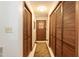 Hallway with closet space and carpet runner at 449 Hill Rd, Franklinton, NC 27525