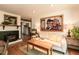 Inviting living room featuring a wood burning fireplace and charming decor at 449 Hill Rd, Franklinton, NC 27525