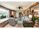 Bright living room with a window seat, built-in bookshelves, and hardwood floors offers a comfortable and stylish space at 449 Hill Rd, Franklinton, NC 27525
