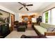 Cozy living room with oak trim that connects to an eat-in kitchen at 449 Hill Rd, Franklinton, NC 27525