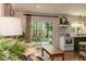 Bright living room with sliding glass doors offering a view of the backyard at 449 Hill Rd, Franklinton, NC 27525