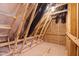 Unfinished attic space shows framing and support beams at 450 Shale Creek Dr, Durham, NC 27703