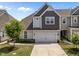 Charming two-story home with a two-car garage and well-maintained landscaping at 450 Shale Creek Dr, Durham, NC 27703